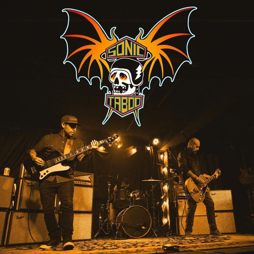 Image of Sonic Taboo - a ONE on Stage band. Two people playing guitar on Stage. Sonic Taboo logo overlayed.