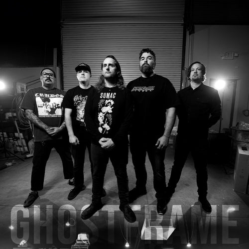 Black and white photo of a band posing together with 'Ghost Flame' text.