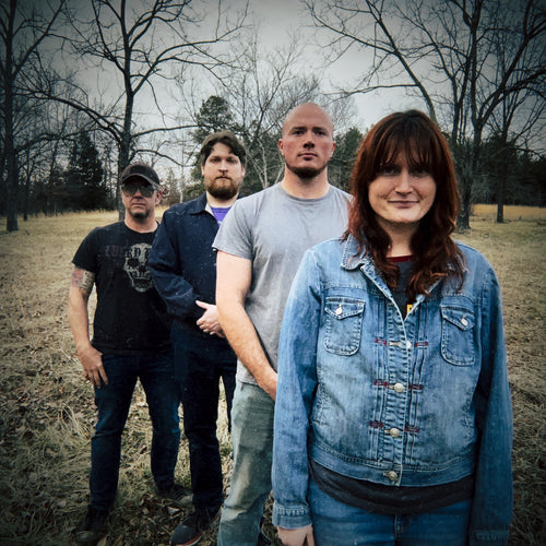 Image of Red Sun Sermon - a ONE on Stage band. Four band members standing in field. 